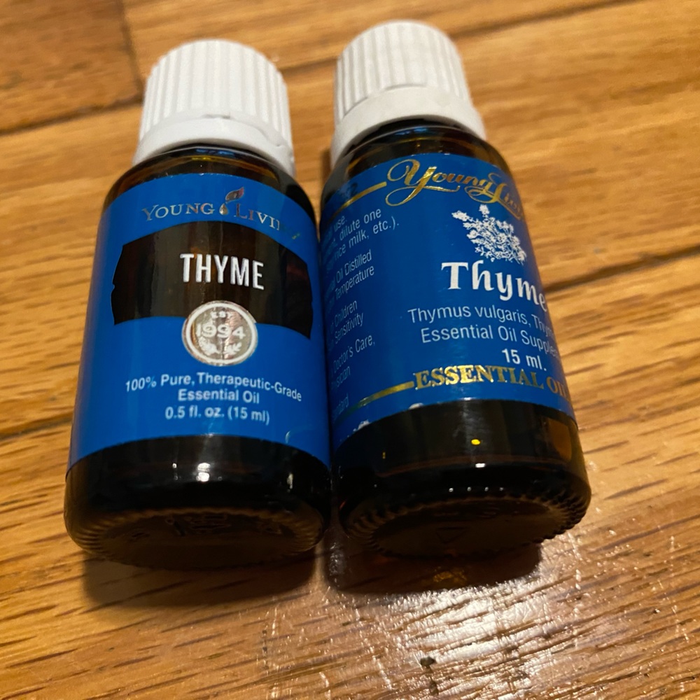 2 Young Living Thyme essential oils. Both are 0.5 fl oz (15ml). Both NWT- sealed